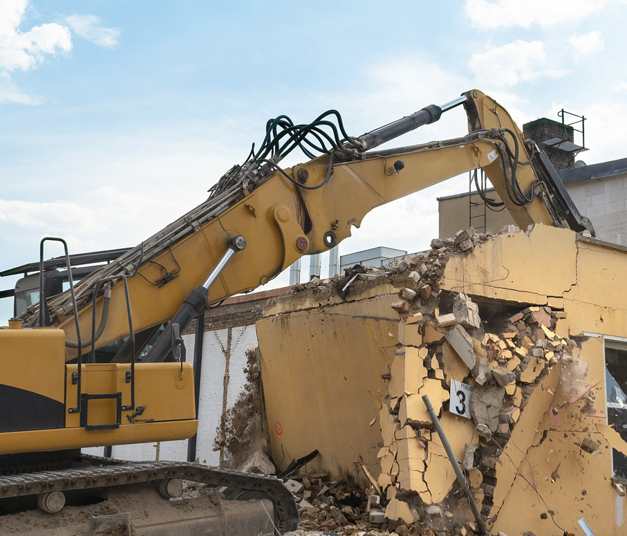 machine knocking building down